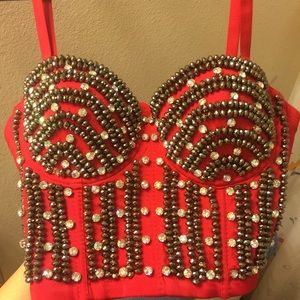 Red jeweled bustier.