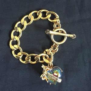 Juicy Couture gold bracelet with heart locket