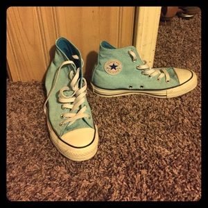 Light blue high top converse