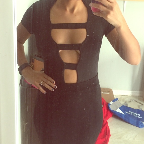 Black one piece with cut out middle - Picture 1 of 4