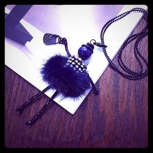 Navy blue fur pom lady pendant on long necklace