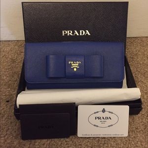 prada saffiano bow continental wallet prada saffiano bow continental wallet