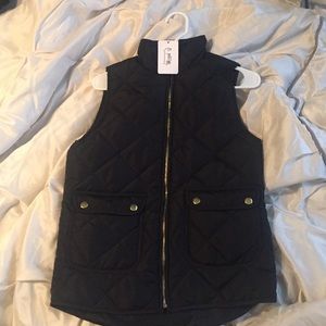 Black puffy vest