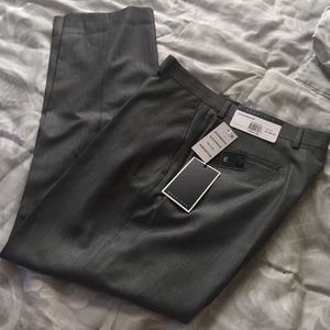 Men's slacks. Never worn with tags.