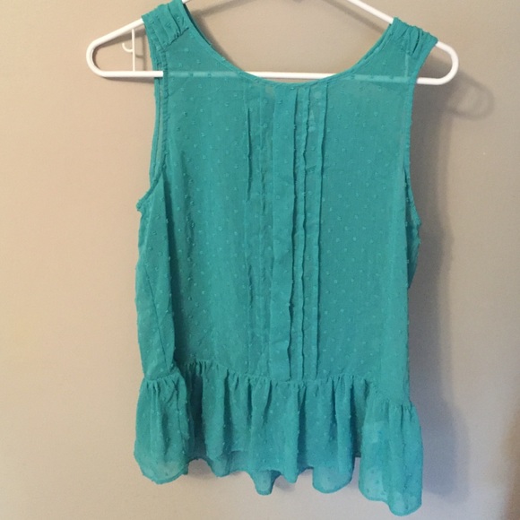 Sheer sleeveless blouse. Size medium.