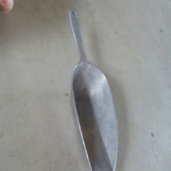 A bath salt scoop antique