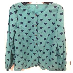 Green blouse with hearts