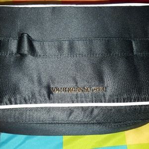 Victoria's Secret makeup/undergarment bag.