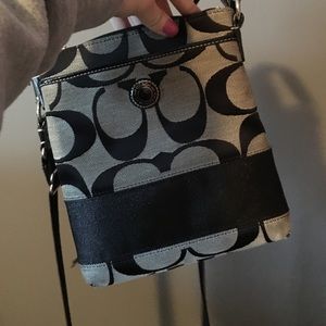Black coach purse.