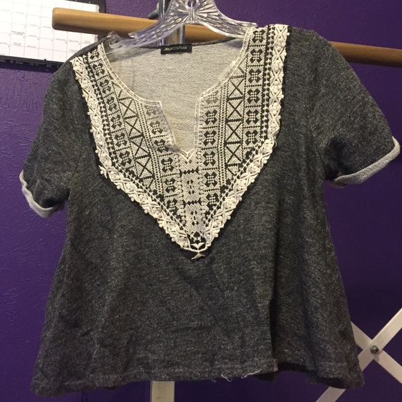 crop top with tribal pattern on collar