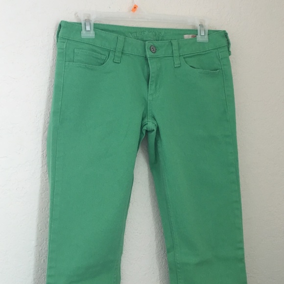 green skinny jeans