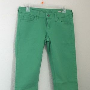 green skinny jeans