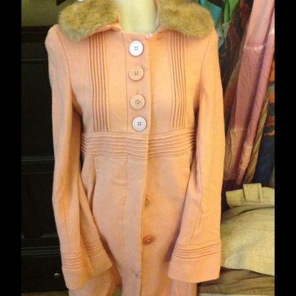 Vintage pink coat with faux fur collar.