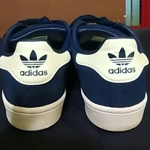 Navy blue adidas superstar