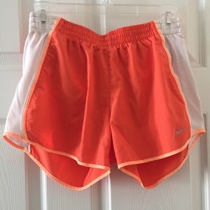 Orange Nike DRI-FIT shorts