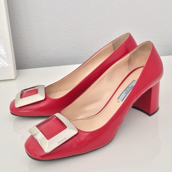 Prada silver buckle pumps