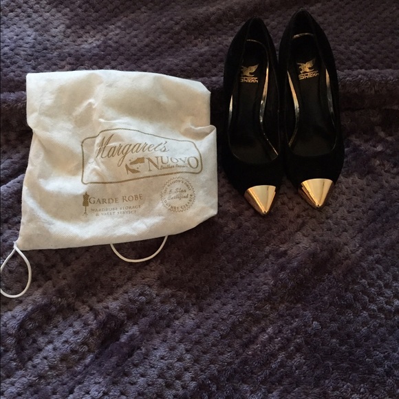 Gold cap toe sued heels