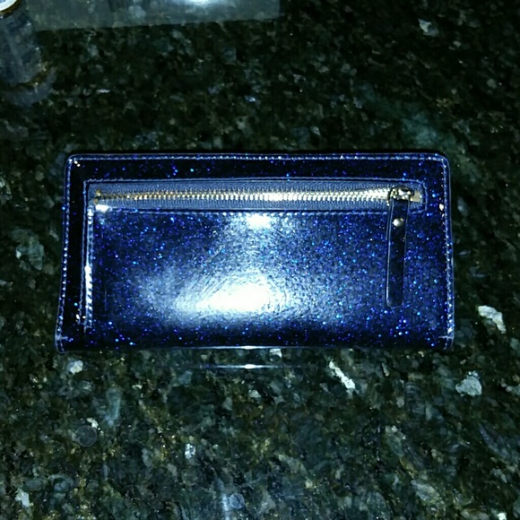 kate spade Bags - Kate Spade blue glitter wallet just reduced kate spade Bags - Kate Spade blue glitter wallet just reduced
