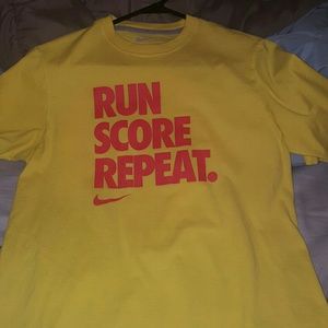 Nike shirt , run score repeat