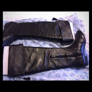 Black leather boots with tassels