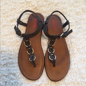 Black sandals with gold