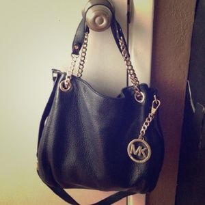 Black leather mk purse