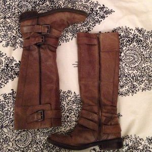 Tall brown leather boots