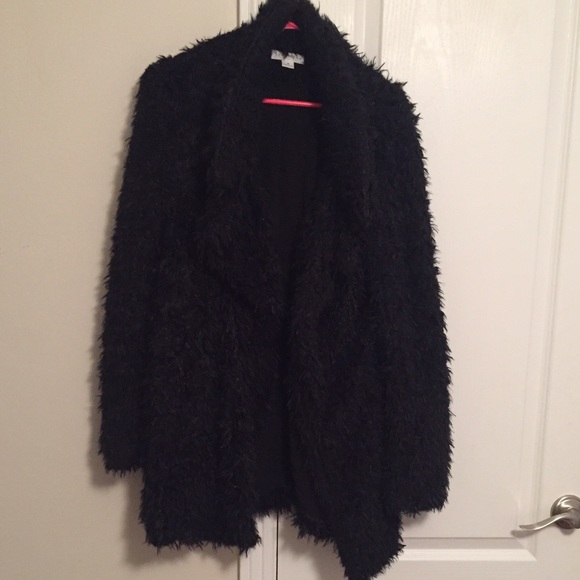 Faux fur black cardigan. Hits at mid thigh