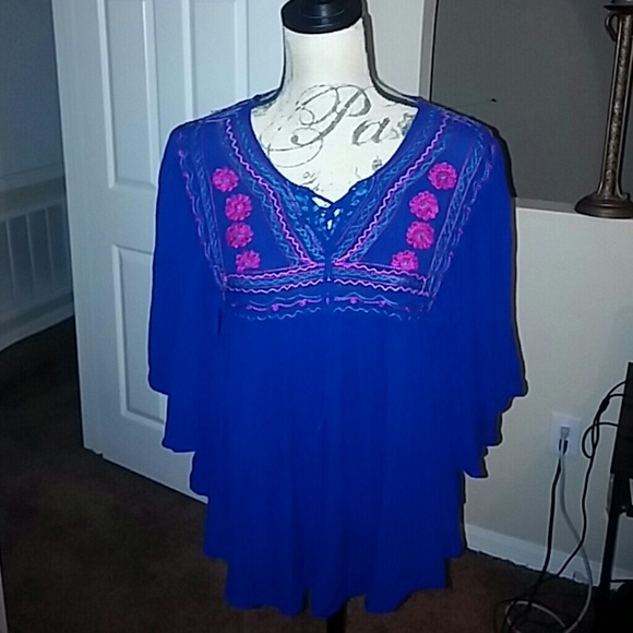 Japna bat winged high low blue top