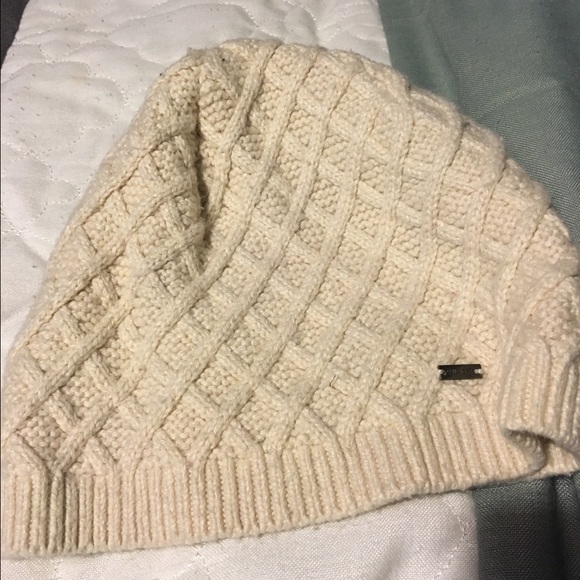 Tommy Hilfiger and Dallas Cowboys beanies.