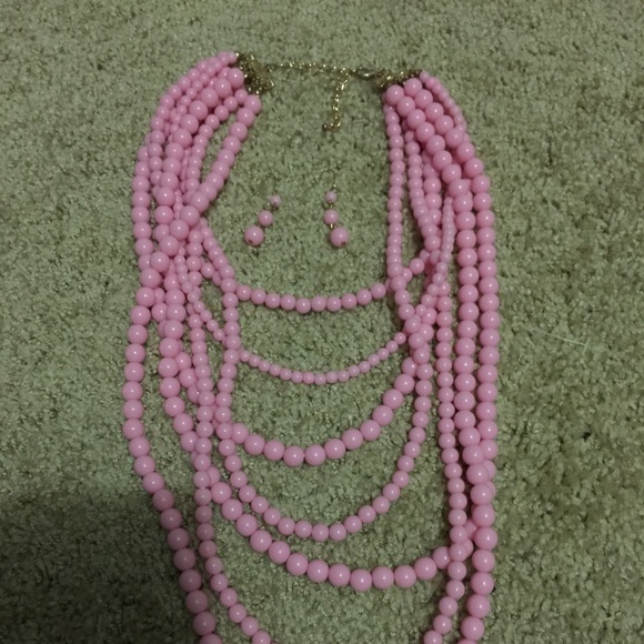Brand new light pink necklace and earring set