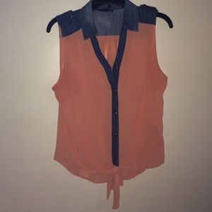 Sheer peach colored shirt.