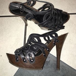 Black heels with wood grain bottoms