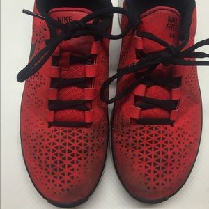 Red and Black Nike free run  3.0