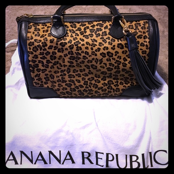 Leopard and cow leather trim satchel. NWOT