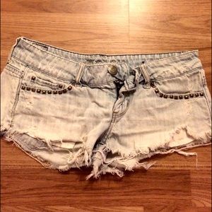 Extra short, frayed/distressed light wash shorts