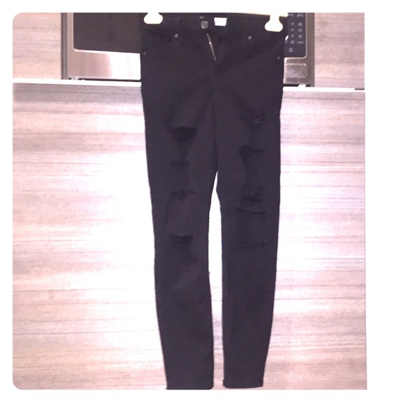 Moto distressed look black skinny jeans