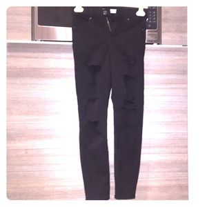 Moto distressed look black skinny jeans