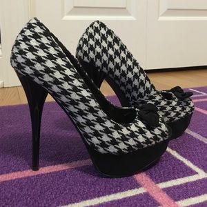 Houndstooth heels with a  cute black bow.