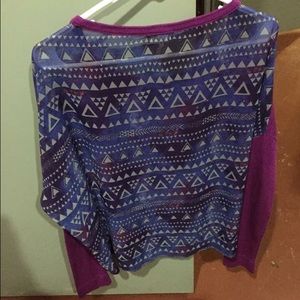 Purple sweater with mesh designed back