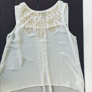 White and Gold sleeveless shirt