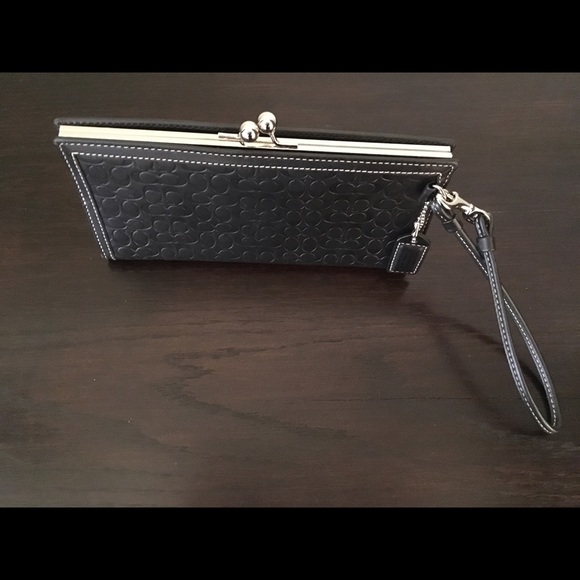 Black Coach clutch and Wrislet.