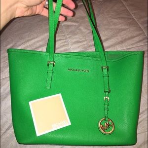 Michael Kors green purse