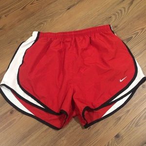 Red Nike Dri-Fit running shorts