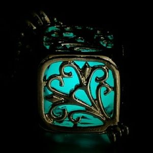 Glow in the dark light blue tree of life necklace