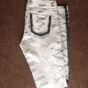 Like new Bebe zebra faded ripped denim