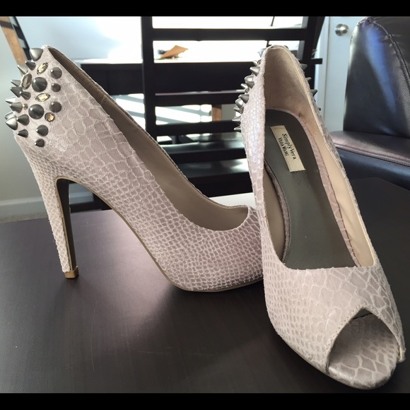 Faux snakeskin studded peep toe pumps