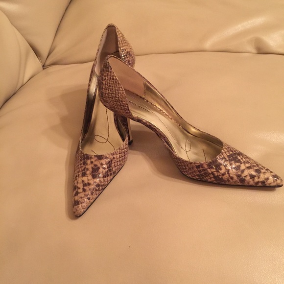 Tan snakeskin pumps