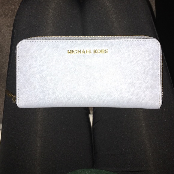 Michael Kors Handbags - authentic blue michael kors wallet