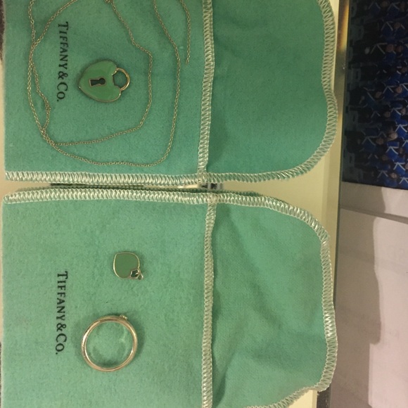 Broken Tiffany necklace/keyhole charmTiffany ring.